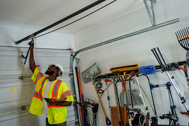 Professional Garage Door Panel Replacement technician working in Trumansburg, NY